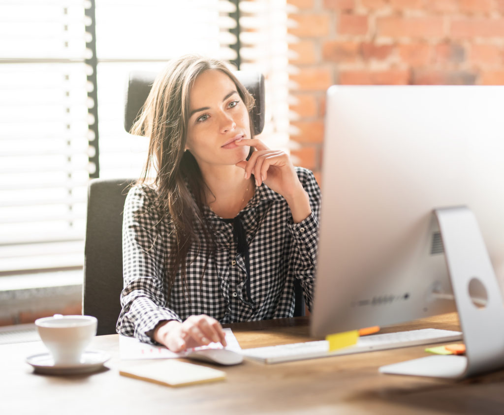 Advisor completing an asynchronous touchpoint from her home office