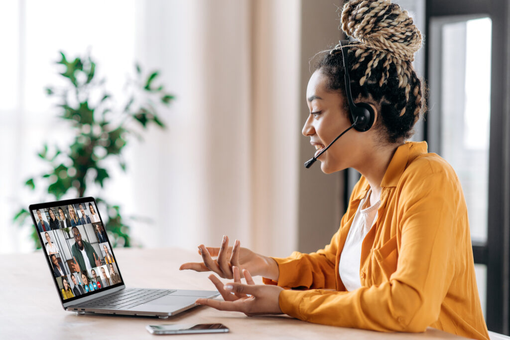 A pharmaceutical company employee is working remotely from home