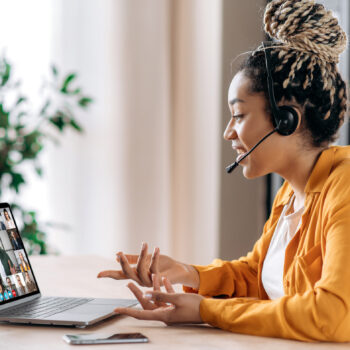 A pharmaceutical company employee is working remotely from home