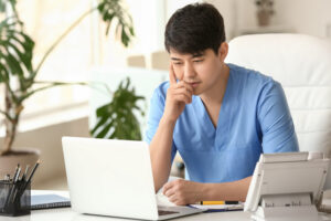 A male nurse is participating in a virtual insight-gathering activity